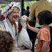 Trudy Bulkley plays the role of Mother Goose during storytelling at the tenth annual Kerrytown BookFest on Sunday. Daniel Brenner I AnnArbor.com